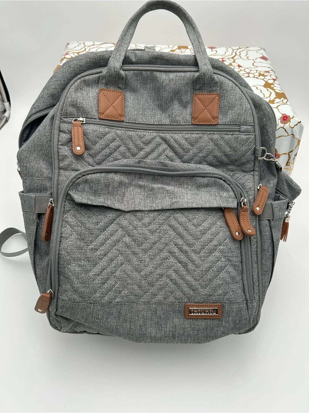 Gray Quilted Baby Bag Backpack with Brown Trim